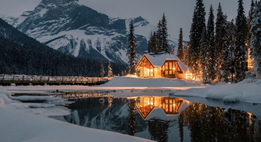 Emerald Lake Lodge in the snow at nightfall