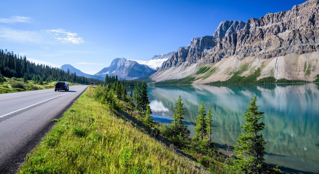 Driving past a lake in the Canadian Rockies