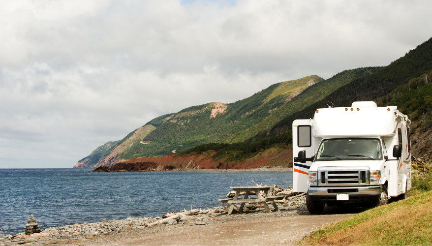 Embarking on a motorhome road trip in Canada Motorhome in Canada against a backdrop of wide open spaces