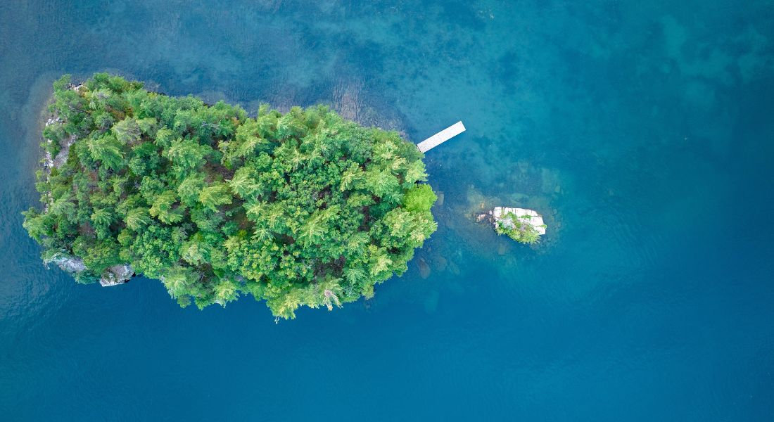 Thousand Islands National Park in Ontario Drone view of Thousand Islands National Park with two small islands in the middle of the water