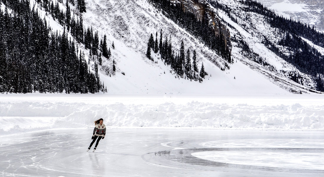 Ice Skating Woman skating on a frozen lake