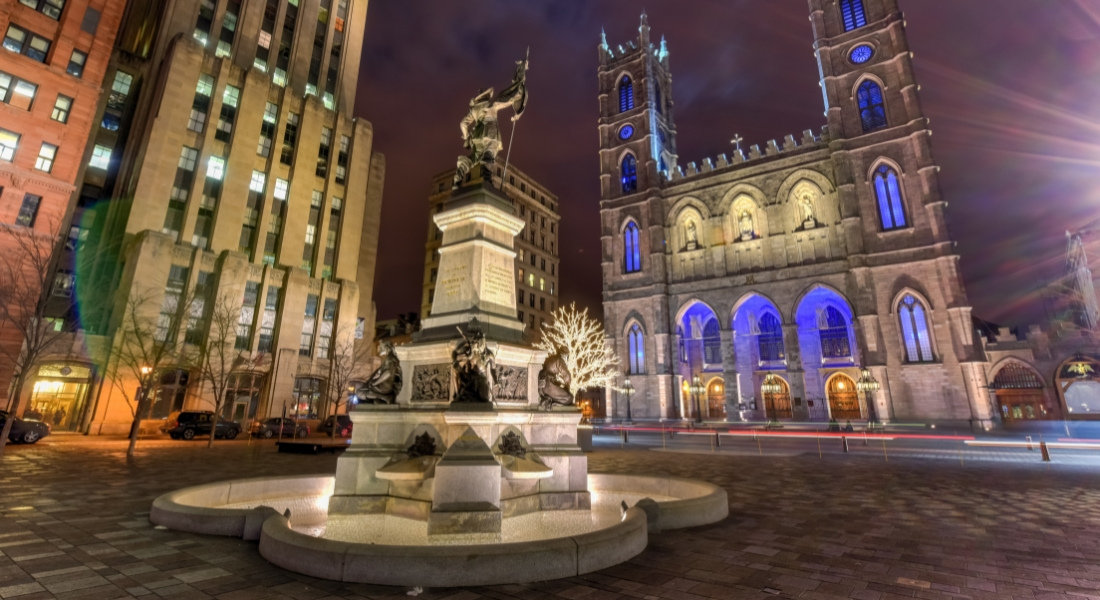 Place d'Armes in Montreal in the evening Historical visit of Montreal