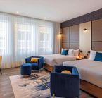 Room with two double beds 
