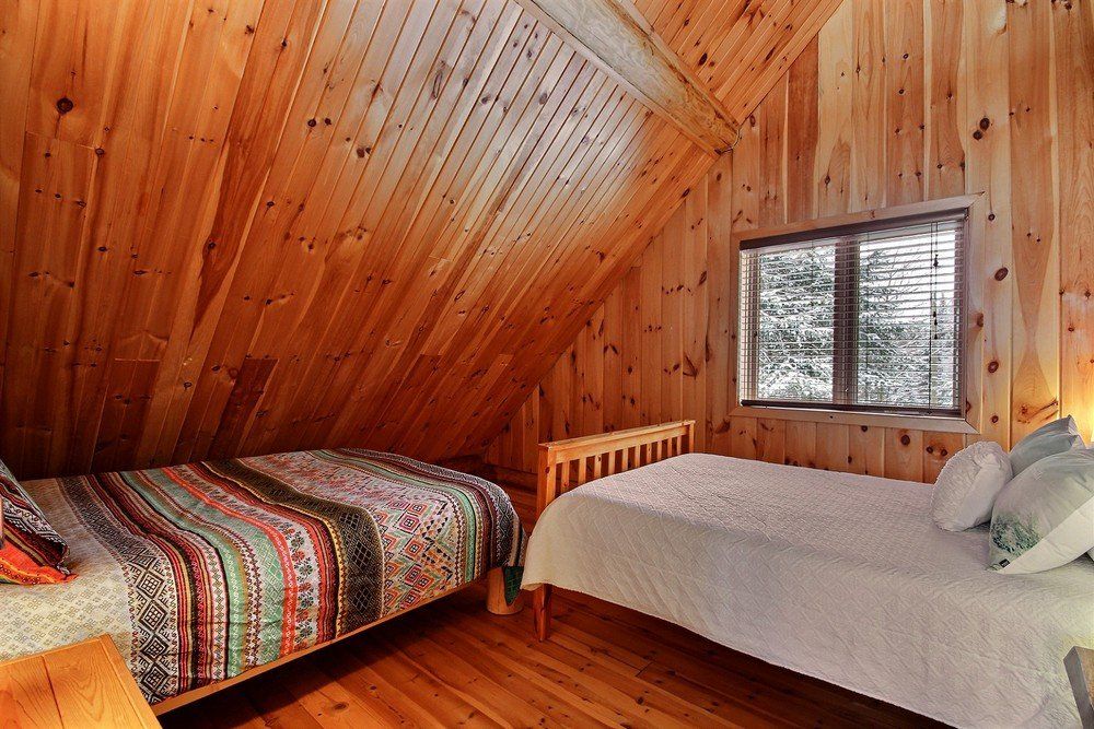 Chalet en bois rond Le Pinecone - Chambre avec 2 lits