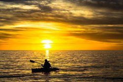 Sea kayaking at sunset, Forillon Park