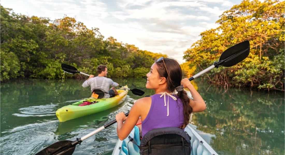 Two people kayaking in the mangroves, Florida Keys
