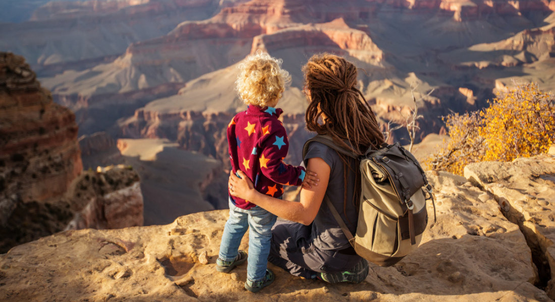 Travel safely Mother and son at the Grand Canyon