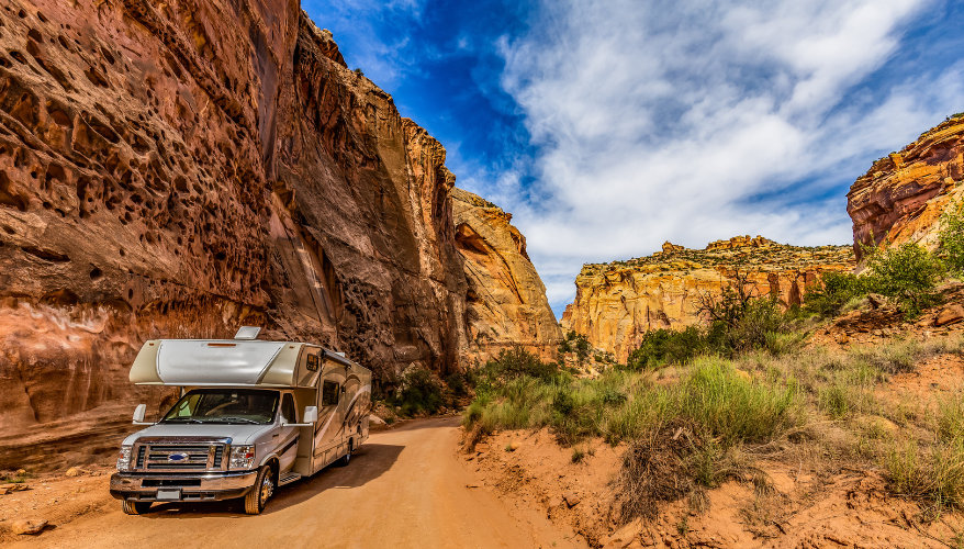 Motorhoming in the national parks A grey motorhome on a Grand Canyon road in Utah