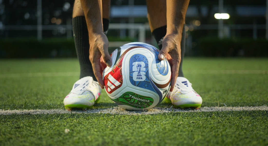Go see a soccer match Man holding the soccer ball from the 2026 FIFA World Cup