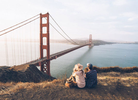 Couple admiring the Golden Gate Bridge in San Francisco