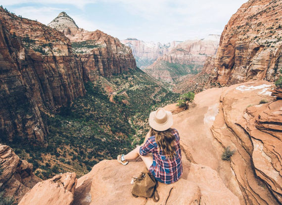 Hiker admiring the landscape of Yosemite