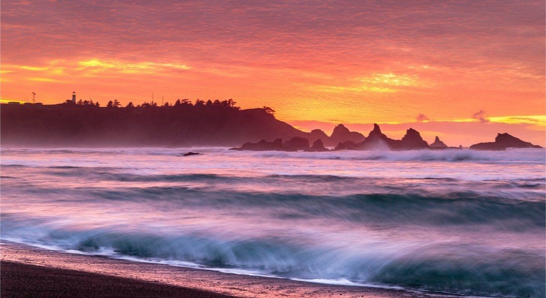West coast sunset on the beach at Cape Banco State Park campground